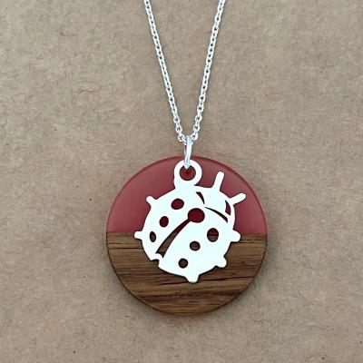 Coccinelle rouge transparent