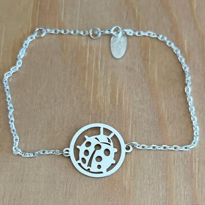 Bracelet Coccinelle jeton découpé sur chaîne argent 925/1000